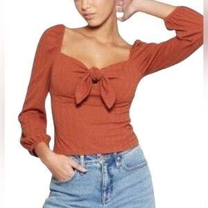 M Burnt Orange Knot Collar Long-Sleeve Top by Wild Fable